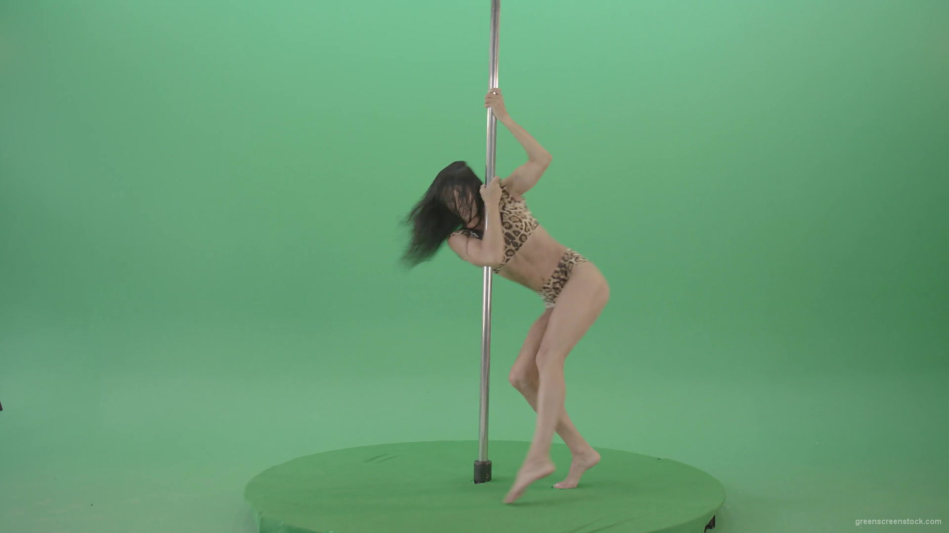 Stripteas-Girl-in-leopard-skin-wear-spinning-on-pilon-dancing-pole-isolated-on-Green-Screen-4K-Video-Footage-1920_009 Green Screen Stock