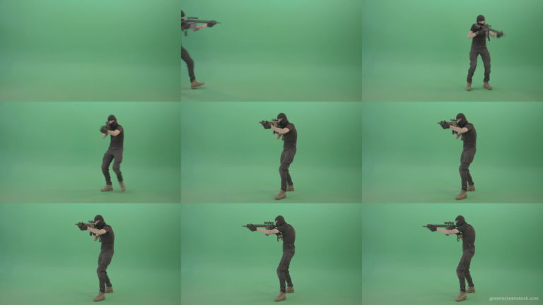 Young-Terrorist-in-mask-moving-with-machine-gun-and-shoot-enemy-on-green-screen-4K-Video-Footage-1920 Green Screen Stock