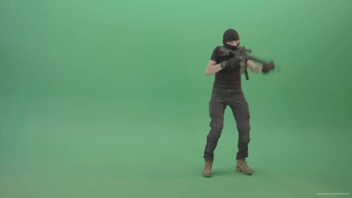 vj video background Young-Terrorist-in-mask-moving-with-machine-gun-and-shoot-enemy-on-green-screen-4K-Video-Footage-1920_003