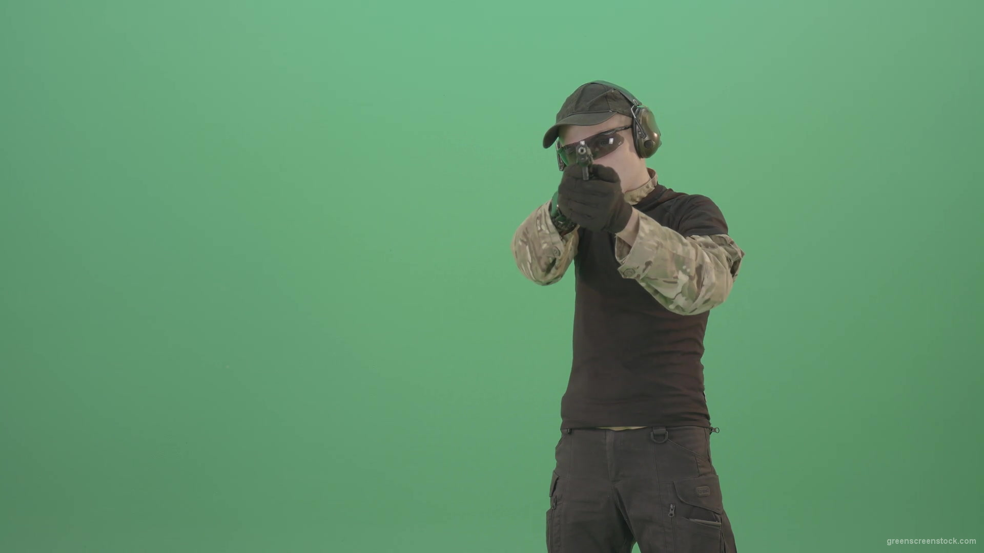 Young-boy-sodier-testin-small-pistol-gun-and-shooting-isolated-on-green-screen-4K-Video-Footage-1920_006 Green Screen Stock