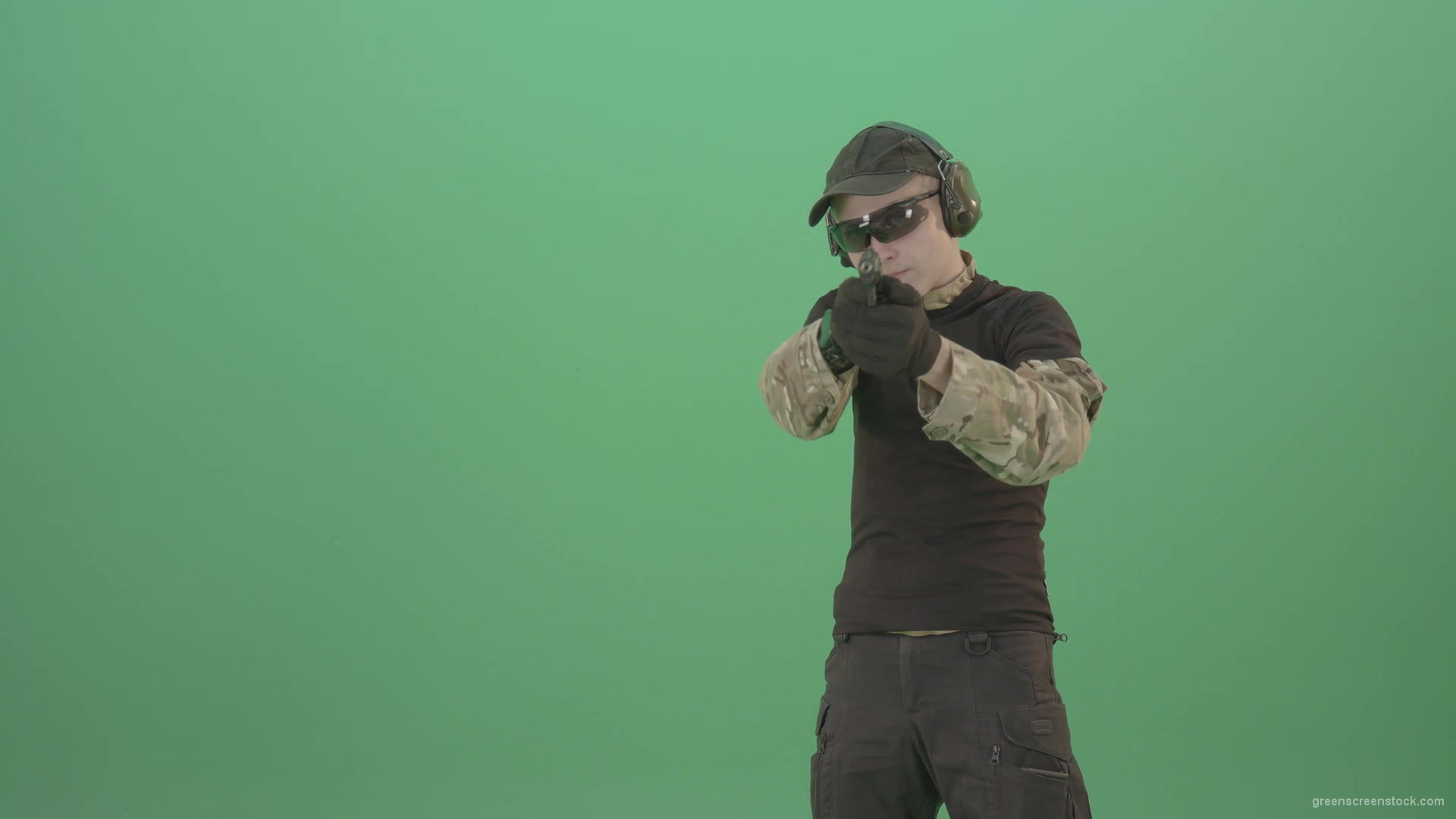 Young-boy-sodier-testin-small-pistol-gun-and-shooting-isolated-on-green-screen-4K-Video-Footage-1920_007 Green Screen Stock