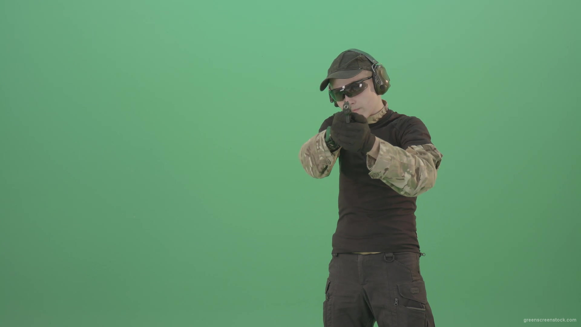 Young-boy-sodier-testin-small-pistol-gun-and-shooting-isolated-on-green-screen-4K-Video-Footage-1920_008 Green Screen Stock