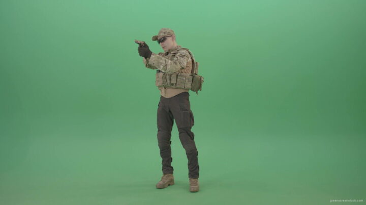 vj video background Young-striker-man-in-Bulletproof-uniform-shoot-from-pistol-gun-on-green-screen-4K-Video-Footage-1920_003