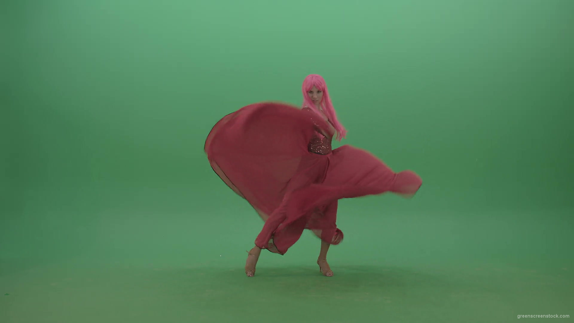 Beautiful-girl-in-red-dress-and-pink-hair-dancing-flamenco-and-spinning-on-green-screen-4K-Video-Footage-1920_002 Green Screen Stock