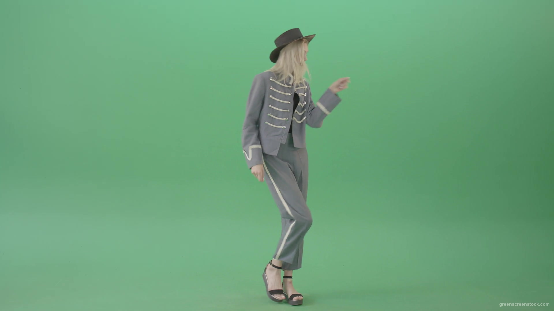 Blonde-Girl-in-Royal-dress-and-black-hat-dancing-house-and-chilling-in-green-screen-studio-4K-Video-Footage-1920_002 Green Screen Stock