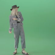 Blonde-Girl-in-Royal-dress-and-black-hat-dancing-house-and-chilling-in-green-screen-studio-4K-Video-Footage-1920_005 Green Screen Stock