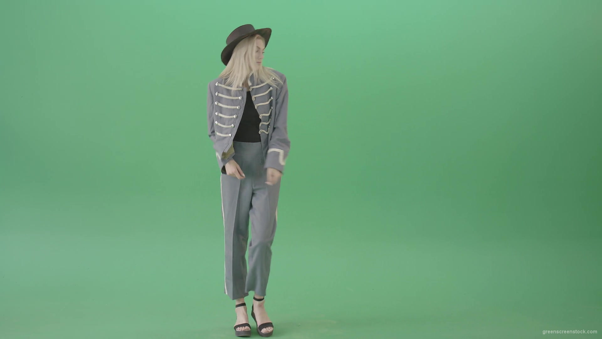 Blonde-Girl-in-Royal-dress-and-black-hat-dancing-house-and-chilling-in-green-screen-studio-4K-Video-Footage-1920_006 Green Screen Stock