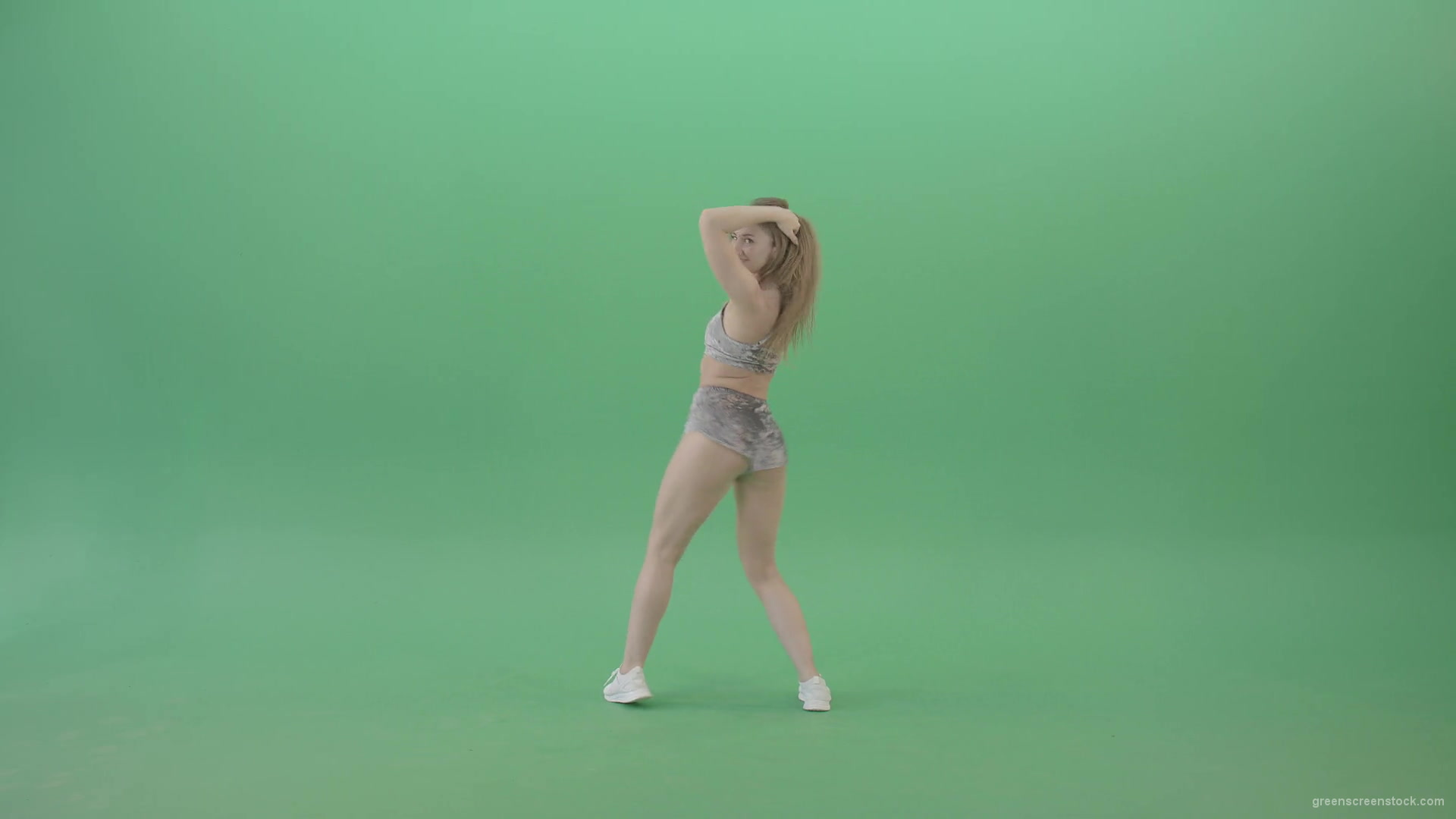 Blonde-young-woman-sexy-dancing-Twerking-hip-hop-elements-over-green-screen-4K-video-footage-1920_004 Green Screen Stock