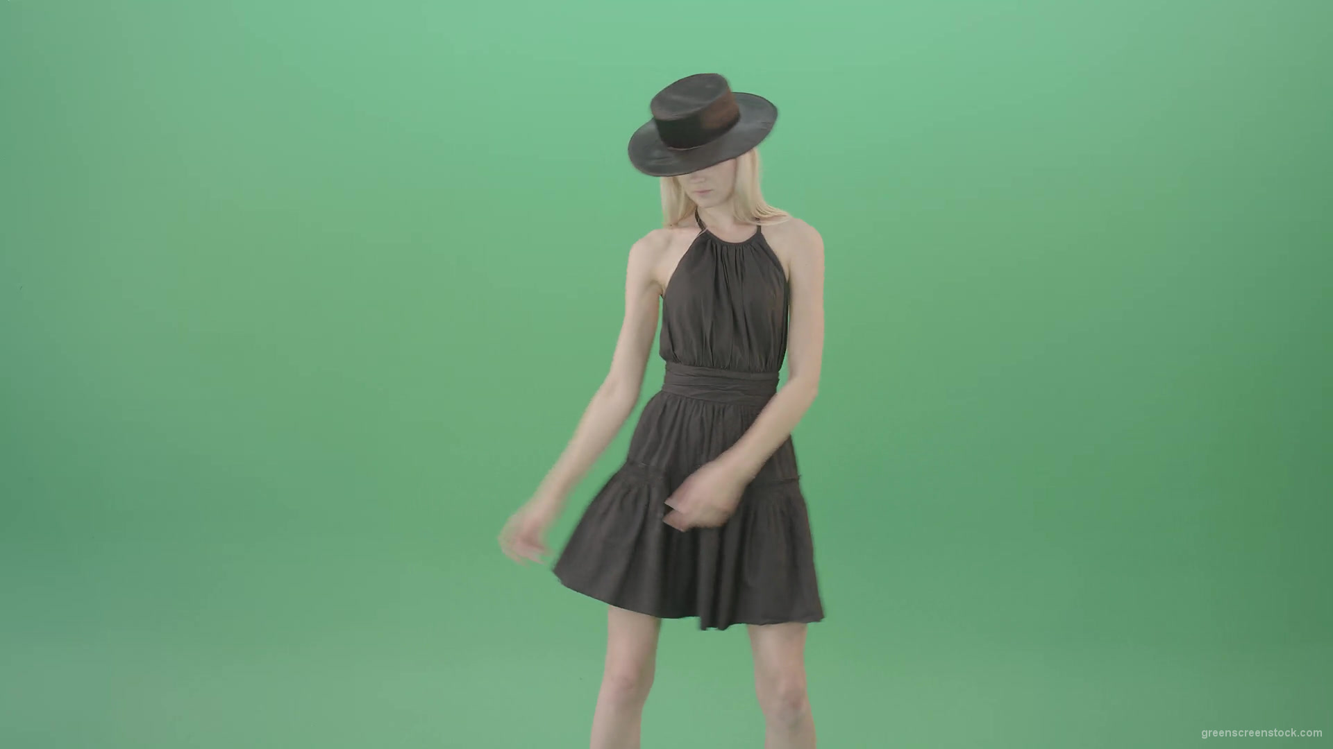 Elegant-girl-in-black-dress-and-hat-chilling-dance-isolated-on-green-screen-4K-Video-Footage-1920_002 Green Screen Stock