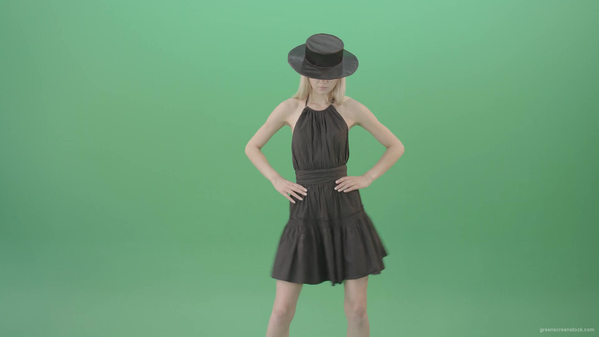Elegant-girl-in-black-dress-and-hat-chilling-dance-isolated-on-green-screen-4K-Video-Footage-1920_004 Green Screen Stock