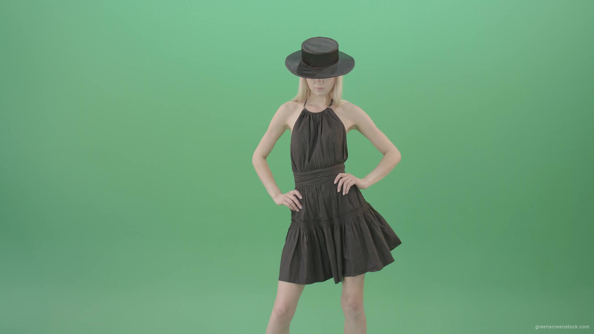 Elegant-girl-in-black-dress-and-hat-chilling-dance-isolated-on-green-screen-4K-Video-Footage-1920_006 Green Screen Stock