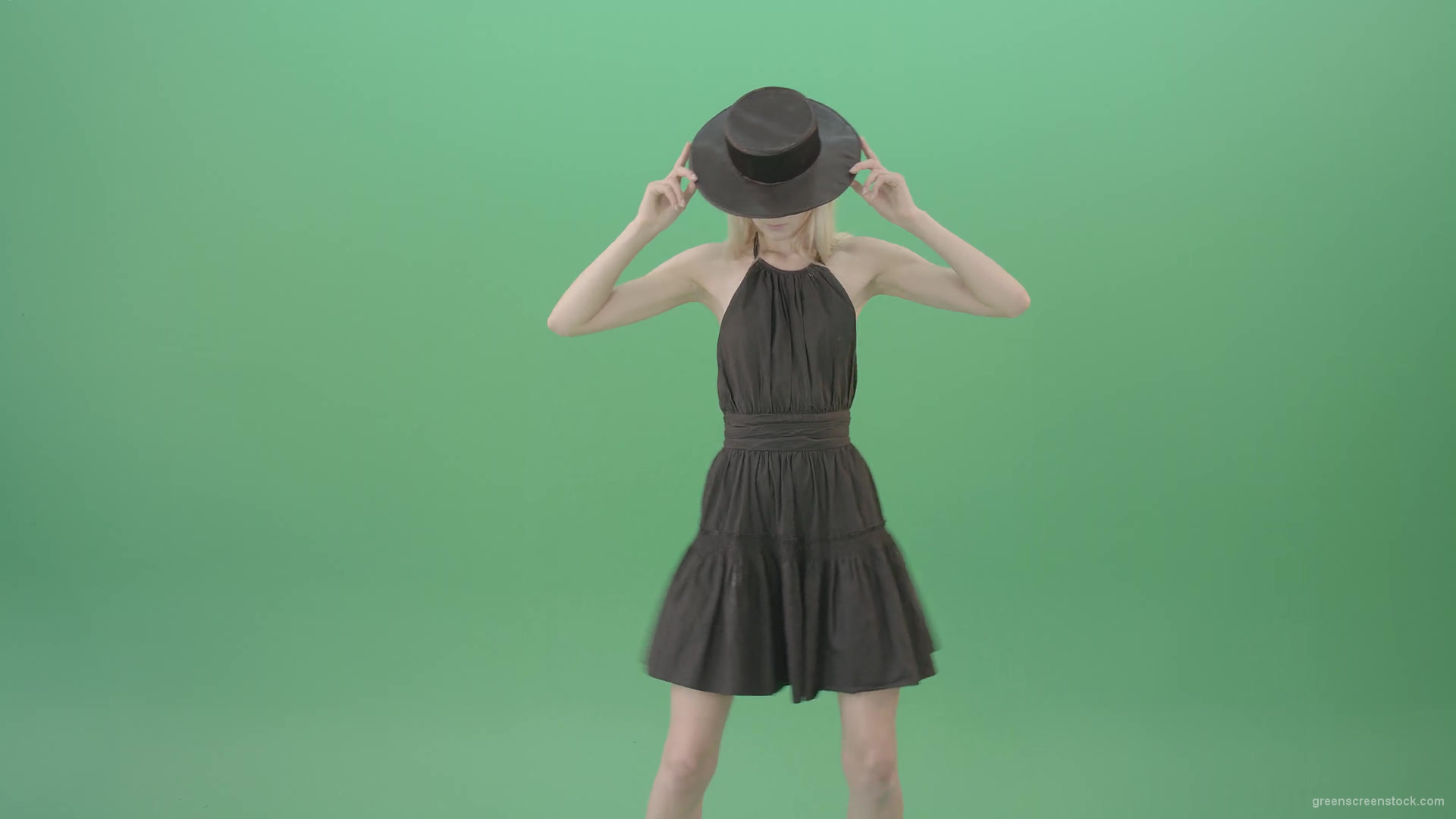 Elegant-girl-in-black-dress-and-hat-chilling-dance-isolated-on-green-screen-4K-Video-Footage-1920_009 Green Screen Stock