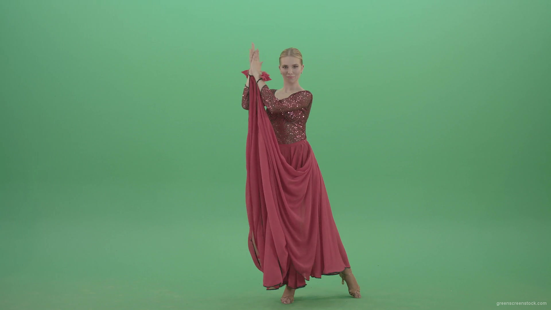 Elegant-woman-in-red-ballroom-dress-spinning-and-clapping-in-hands-isolated-on-green-screen-4K-Video-Footage-1920_006 Green Screen Stock