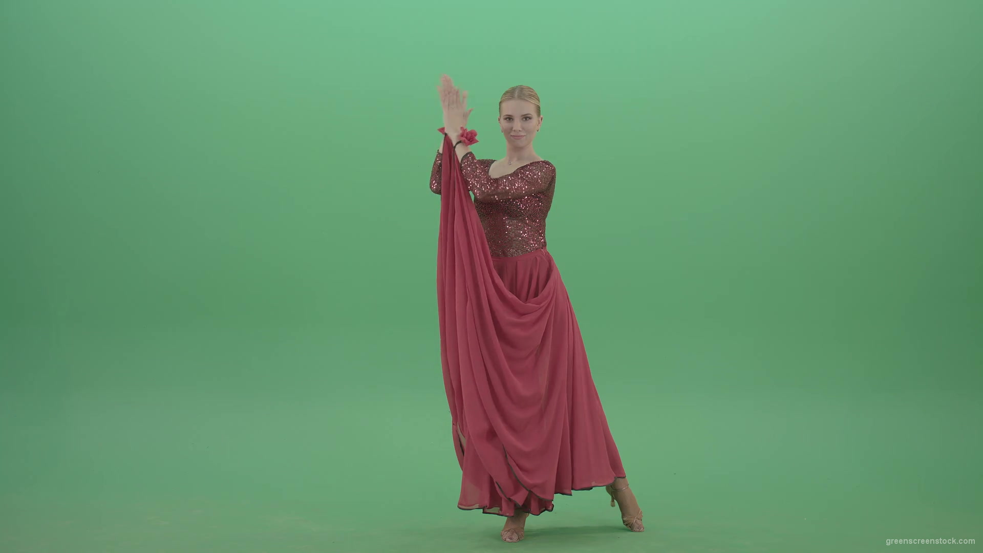 Elegant-woman-in-red-ballroom-dress-spinning-and-clapping-in-hands-isolated-on-green-screen-4K-Video-Footage-1920_007 Green Screen Stock
