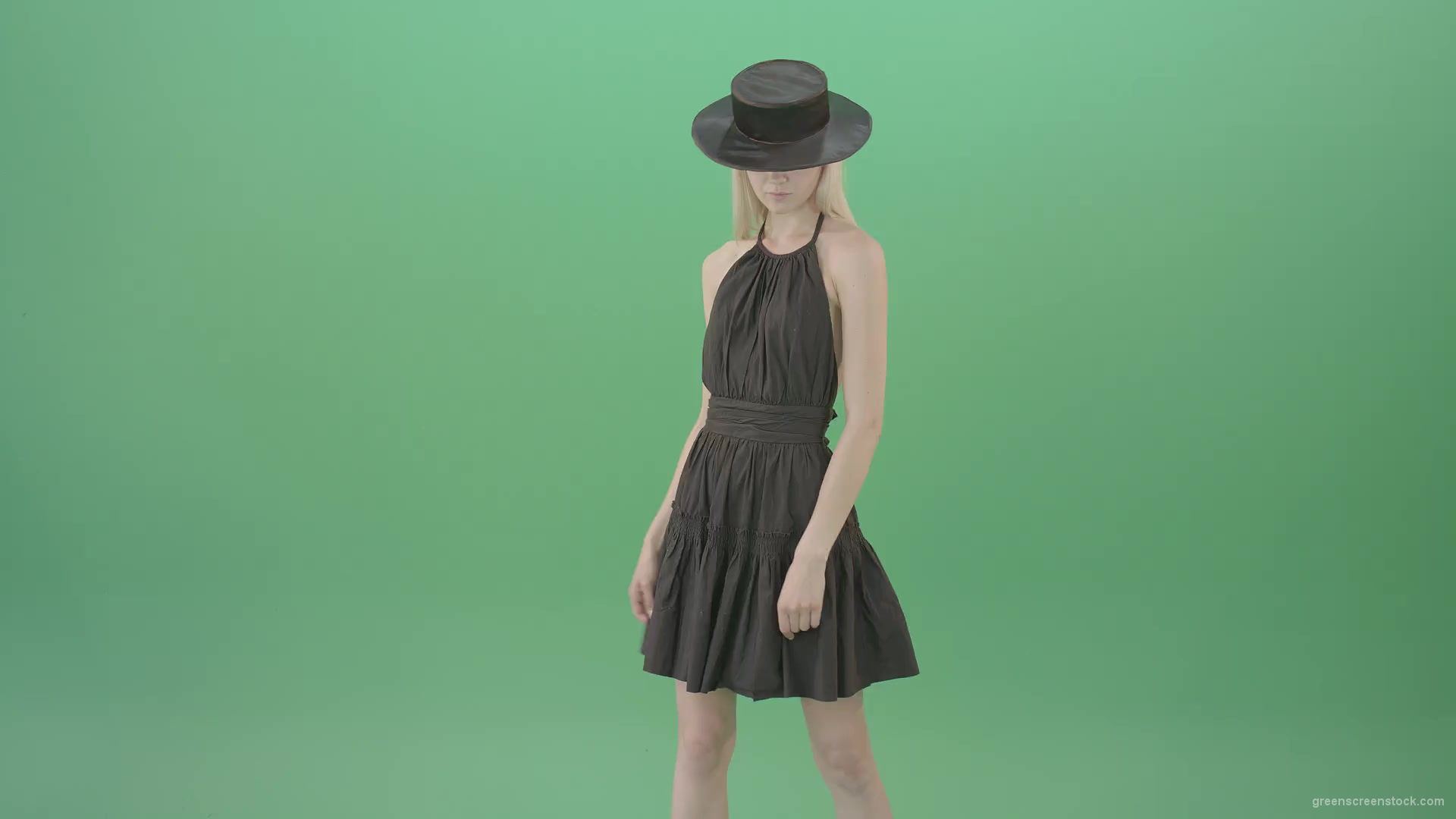 Fashion-model-in-black-dress-posing-dance-isolated-on-green-background-4K-Video-Footage-1920_001 Green Screen Stock