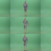 Female-yound-blonde-girl-in-black-mask-and-military-old-uniform-marching-in-front-over-green-screen-4K-Video-Footage-1920 Green Screen Stock