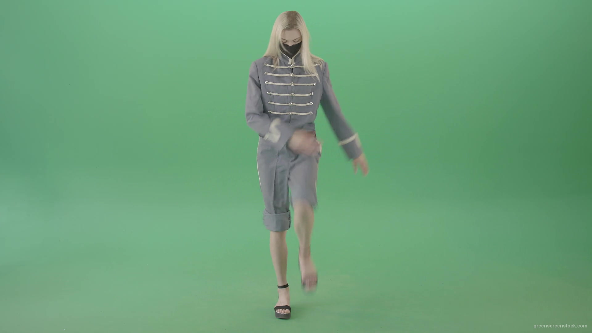 Female-yound-blonde-girl-in-black-mask-and-military-old-uniform-marching-in-front-over-green-screen-4K-Video-Footage-1920_004 Green Screen Stock