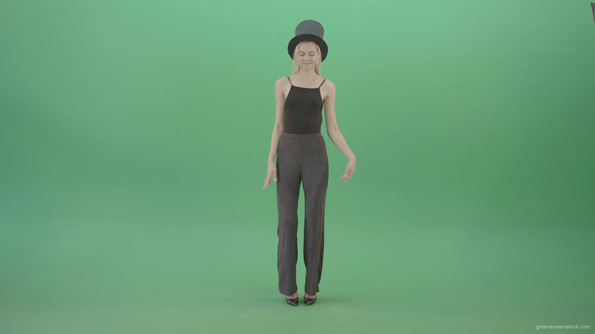 Girl-with-black-busines-cylinder-hat-dancing-isolated-on-green-background-4K-Video-Footage-1920_001 Green Screen Stock