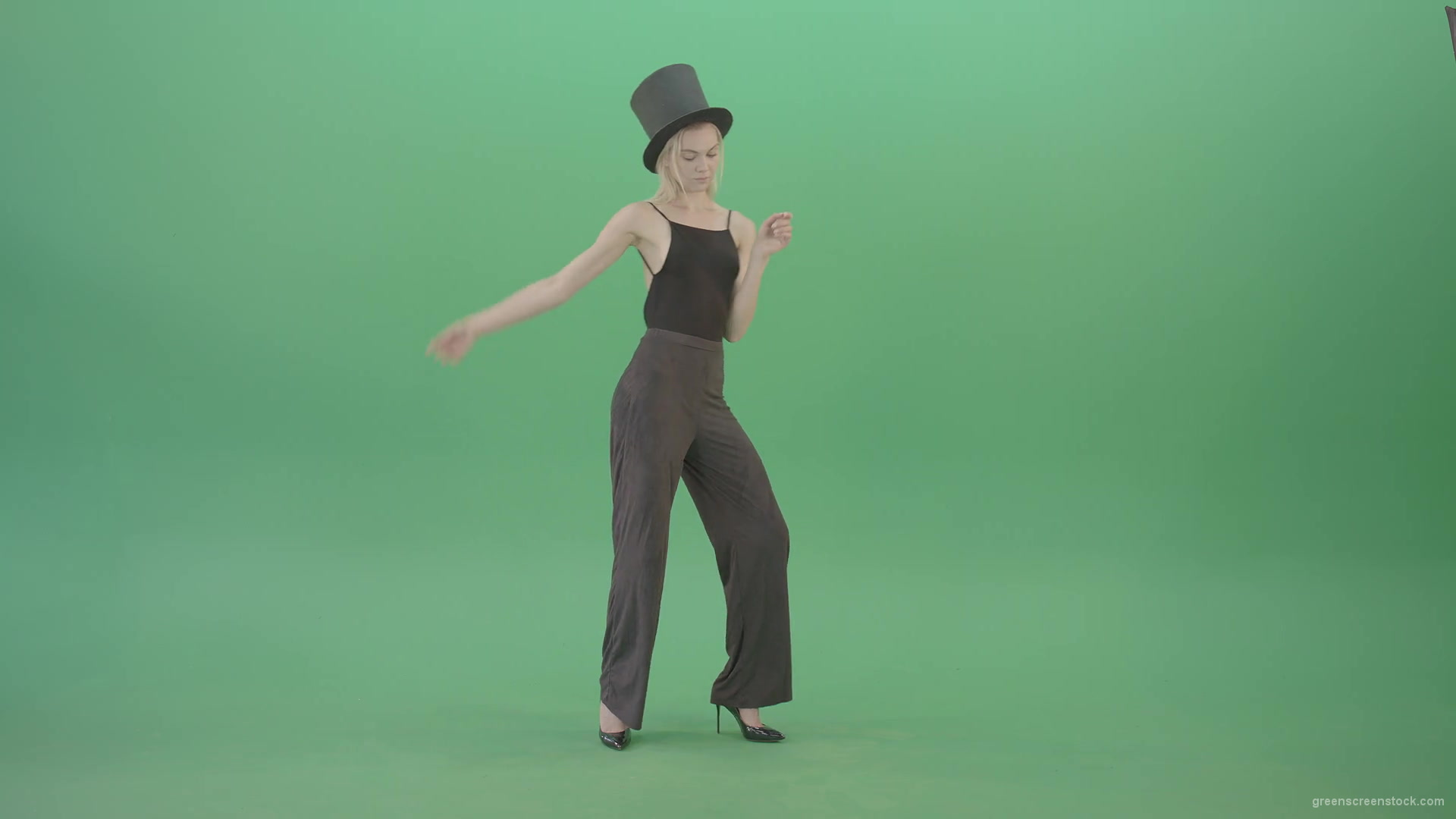 Girl-with-black-busines-cylinder-hat-dancing-isolated-on-green-background-4K-Video-Footage-1920_004 Green Screen Stock
