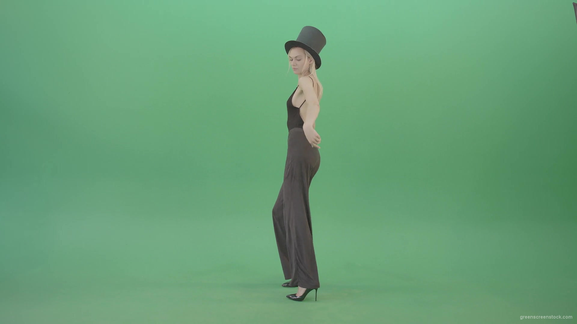Girl-with-black-busines-cylinder-hat-dancing-isolated-on-green-background-4K-Video-Footage-1920_005 Green Screen Stock