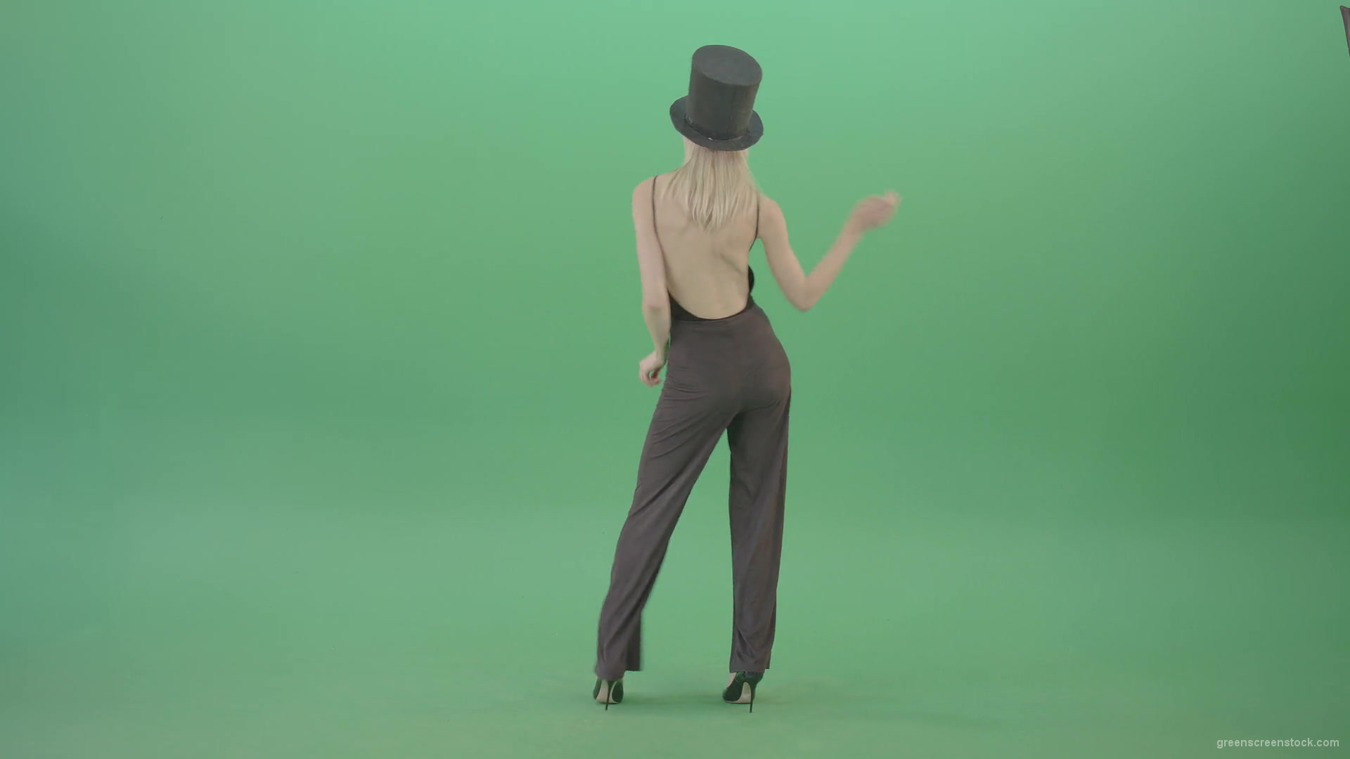 Girl-with-black-busines-cylinder-hat-dancing-isolated-on-green-background-4K-Video-Footage-1920_007 Green Screen Stock
