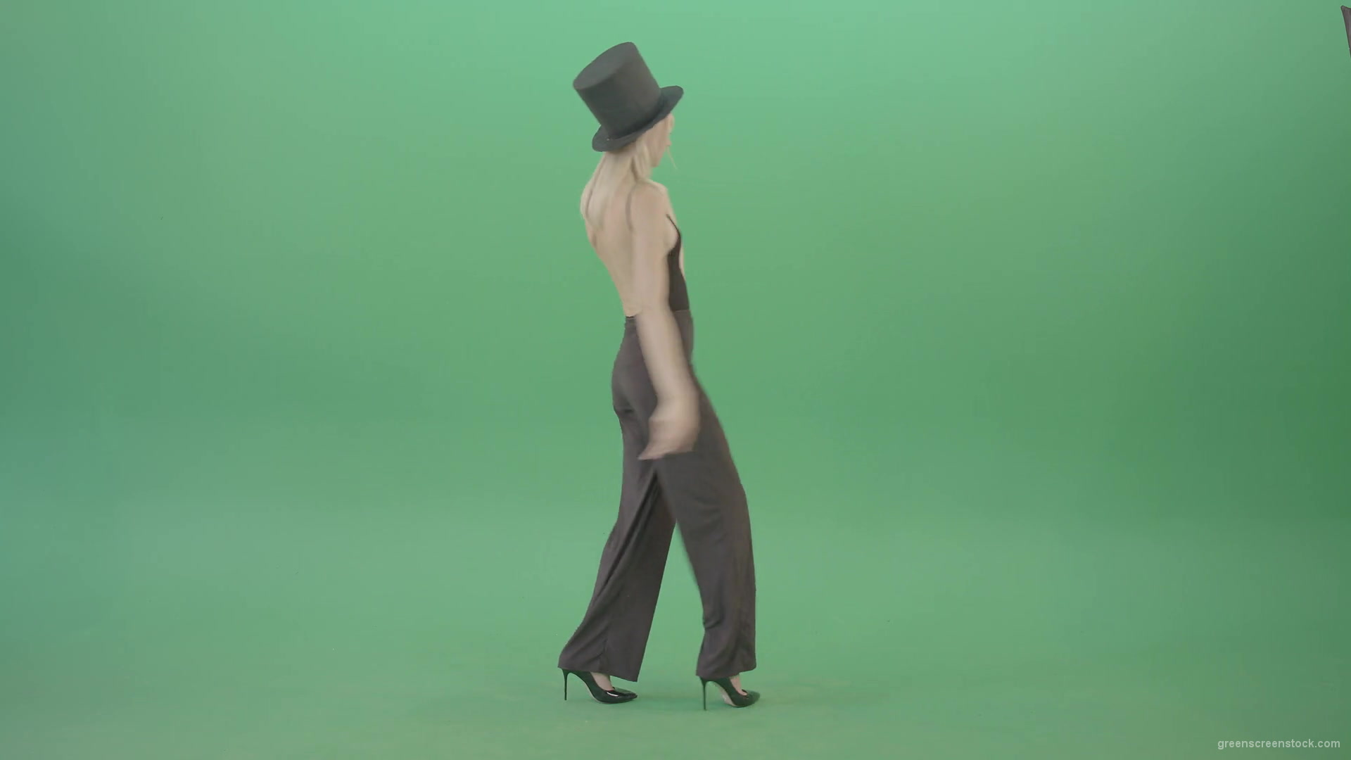 Girl-with-black-busines-cylinder-hat-dancing-isolated-on-green-background-4K-Video-Footage-1920_009 Green Screen Stock