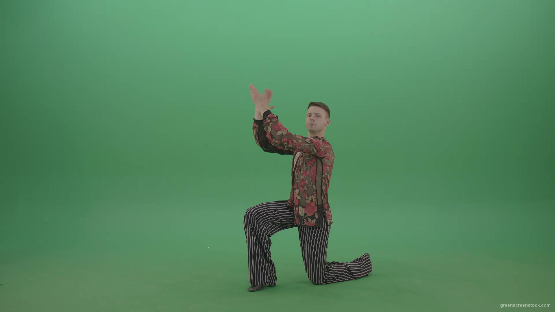 Rumba-Man-get-down-on-one-knees-and-clapping-in-hands-over-green-screen-4K-Video-Footage--1920_004 Green Screen Stock