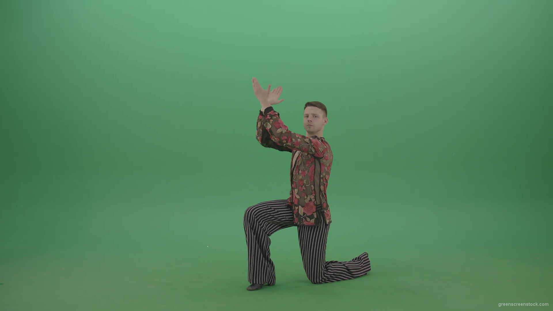 Rumba-Man-get-down-on-one-knees-and-clapping-in-hands-over-green-screen-4K-Video-Footage--1920_005 Green Screen Stock