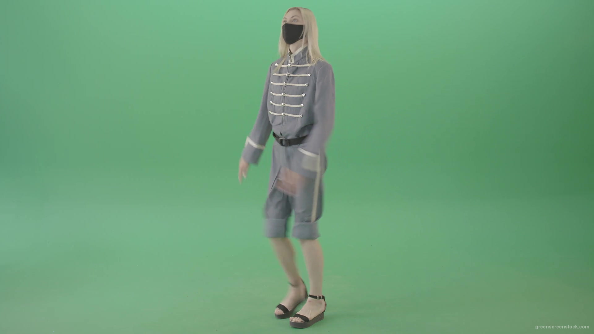Young-Blonde-woman-marching-in-side-view-with-Covid19-mask-on-green-screen-4K-Video-Footage-1920_008 Green Screen Stock
