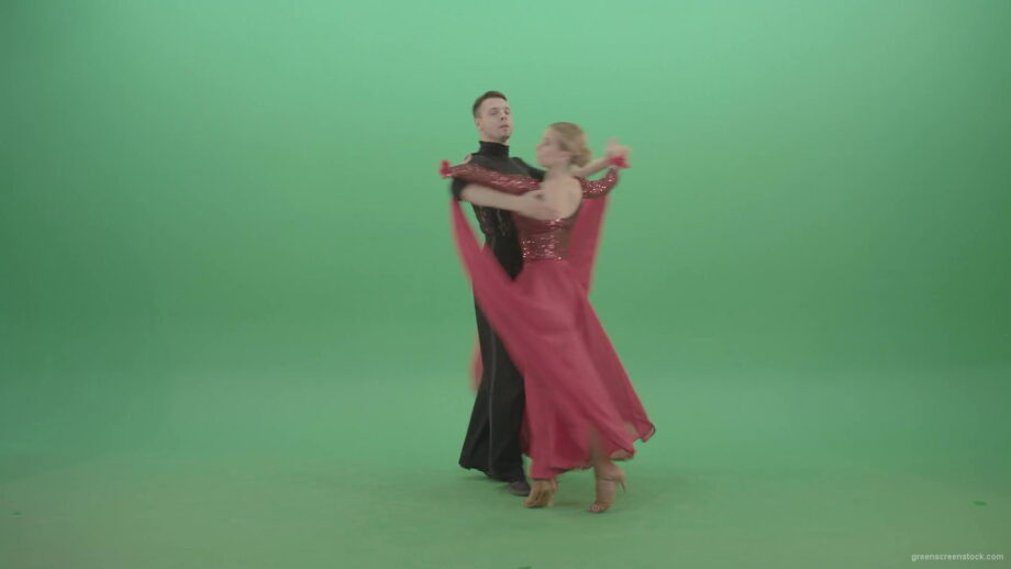 vj video background Young-couple-in-red-black-costume-spinning-dancing-ballroom-latina-dance-over-green-screen-4K-Video-Footage-1920_003