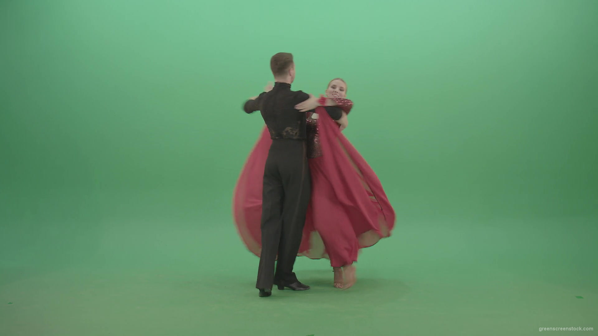 Young-couple-in-red-black-costume-spinning-dancing-ballroom-latina-dance-over-green-screen-4K-Video-Footage-1920_007 Green Screen Stock