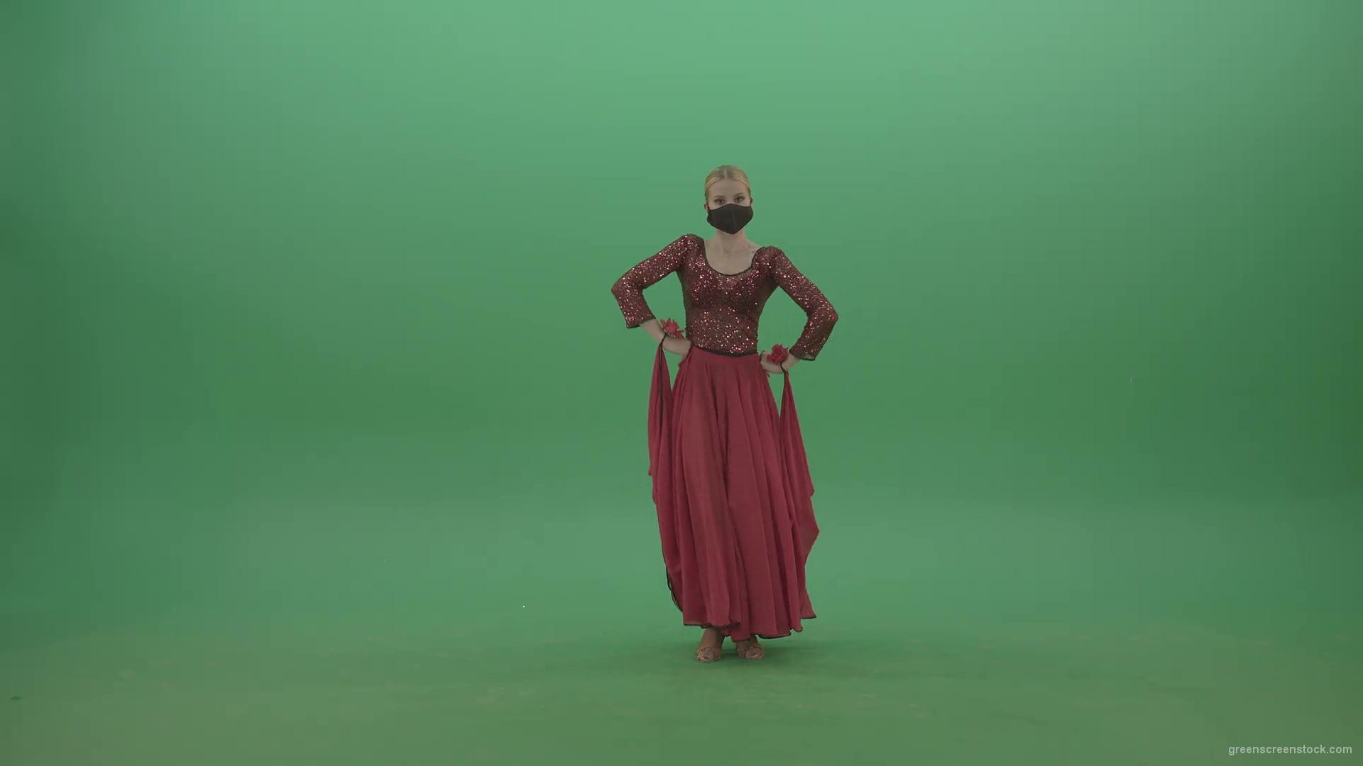 Beauty-Girl-with-black-mask-in-red-rumba-dress-waving-arms-isolated-on-green-screen-4K-Video-Footage-1920_002 Green Screen Stock