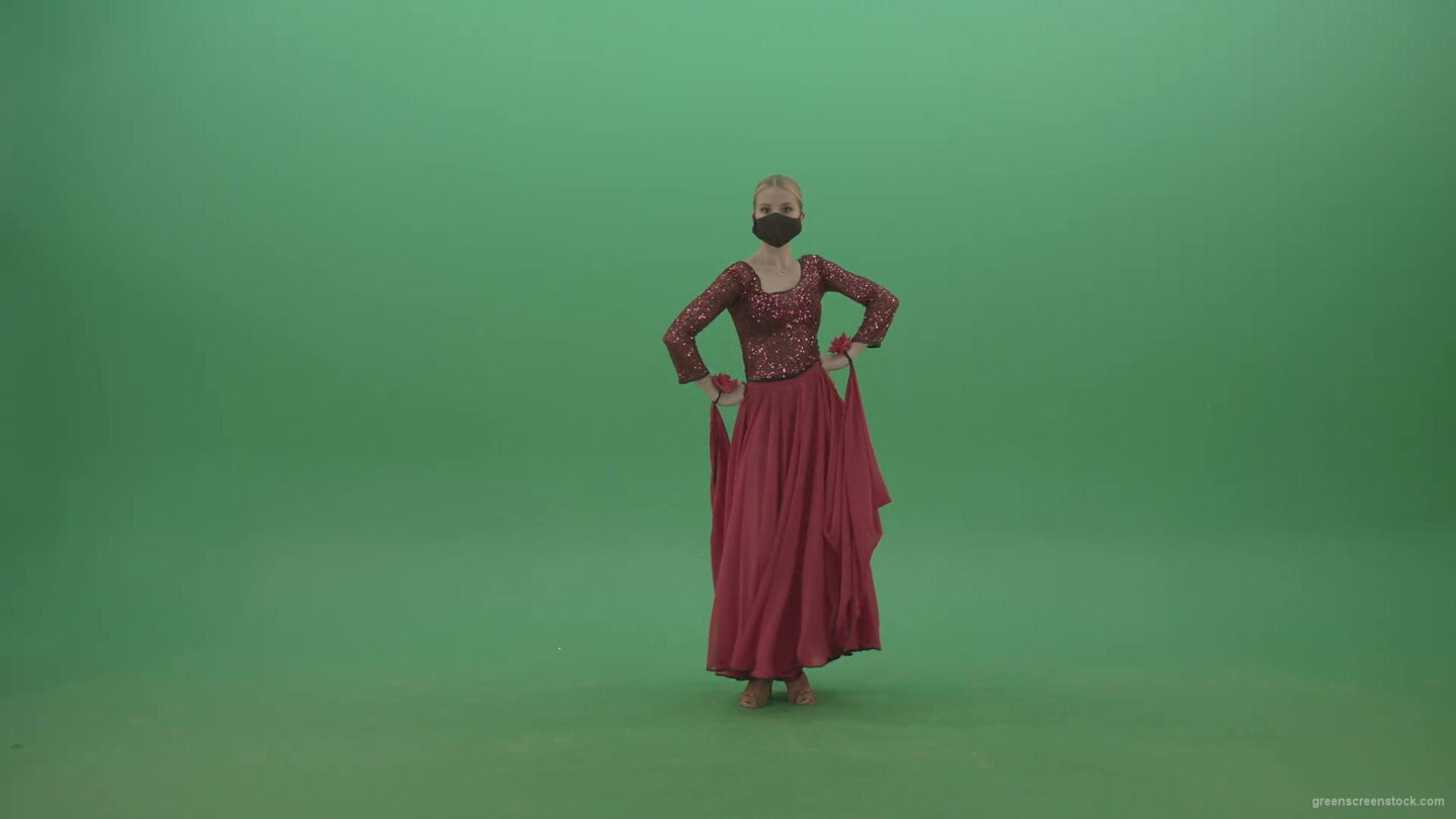 vj video background Beauty-Girl-with-black-mask-in-red-rumba-dress-waving-arms-isolated-on-green-screen-4K-Video-Footage-1920_003