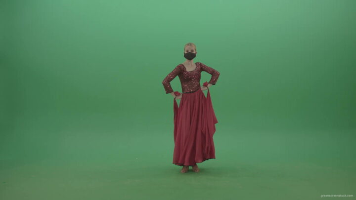 vj video background Beauty-Girl-with-black-mask-in-red-rumba-dress-waving-arms-isolated-on-green-screen-4K-Video-Footage-1920_003
