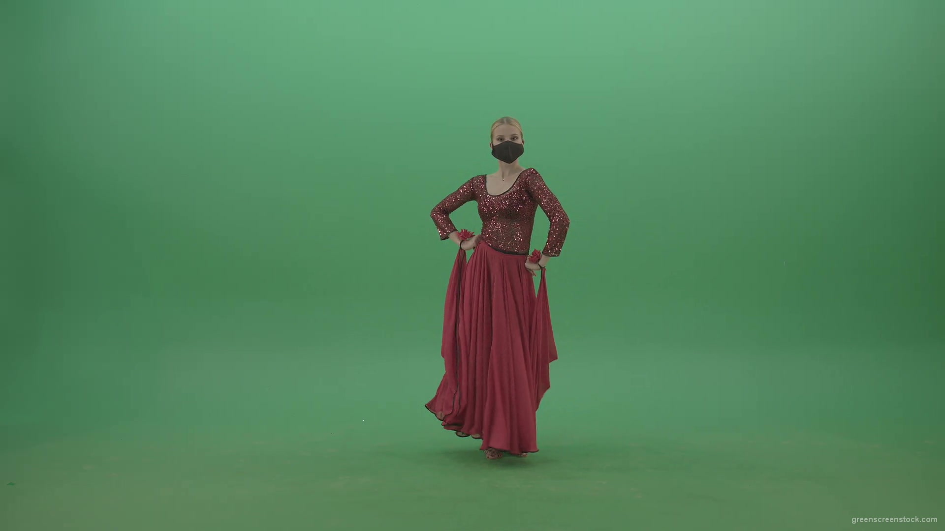 Beauty-Girl-with-black-mask-in-red-rumba-dress-waving-arms-isolated-on-green-screen-4K-Video-Footage-1920_004 Green Screen Stock