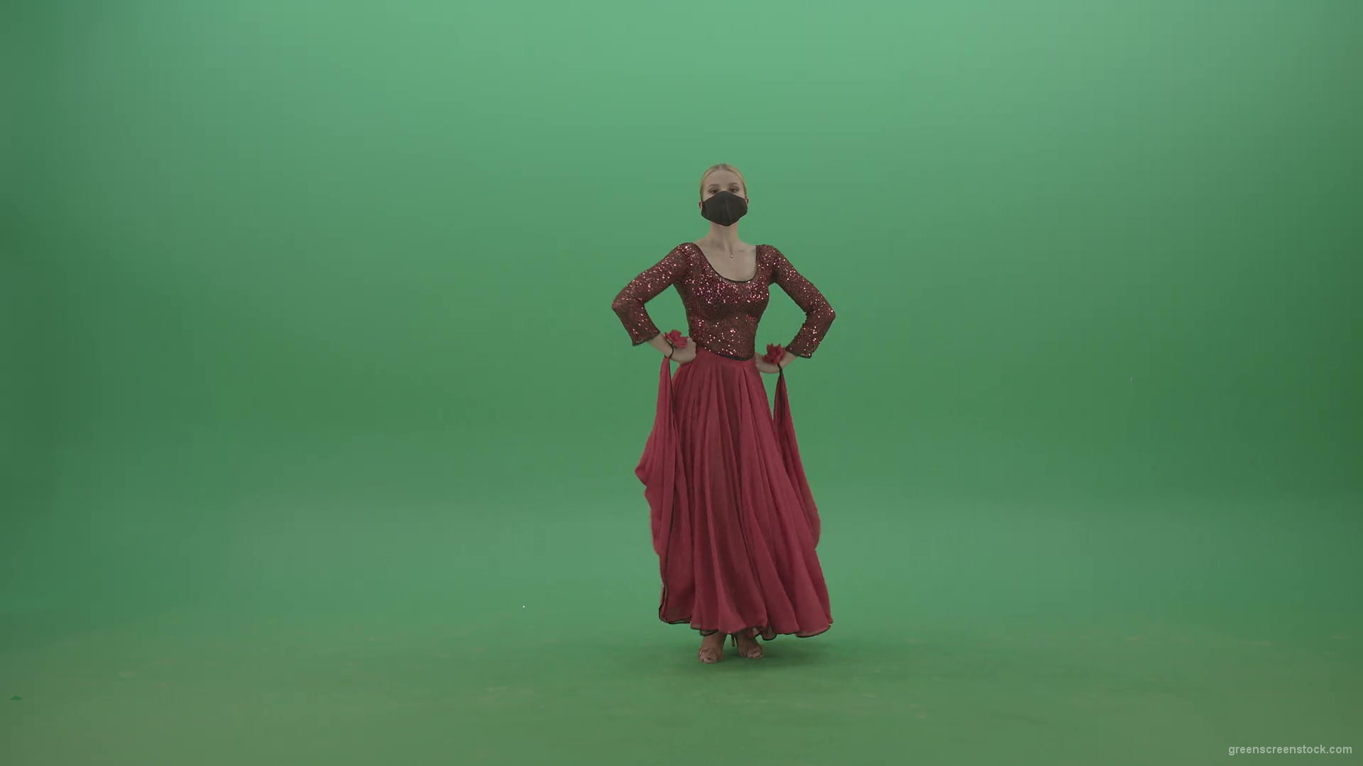 Beauty-Girl-with-black-mask-in-red-rumba-dress-waving-arms-isolated-on-green-screen-4K-Video-Footage-1920_005 Green Screen Stock