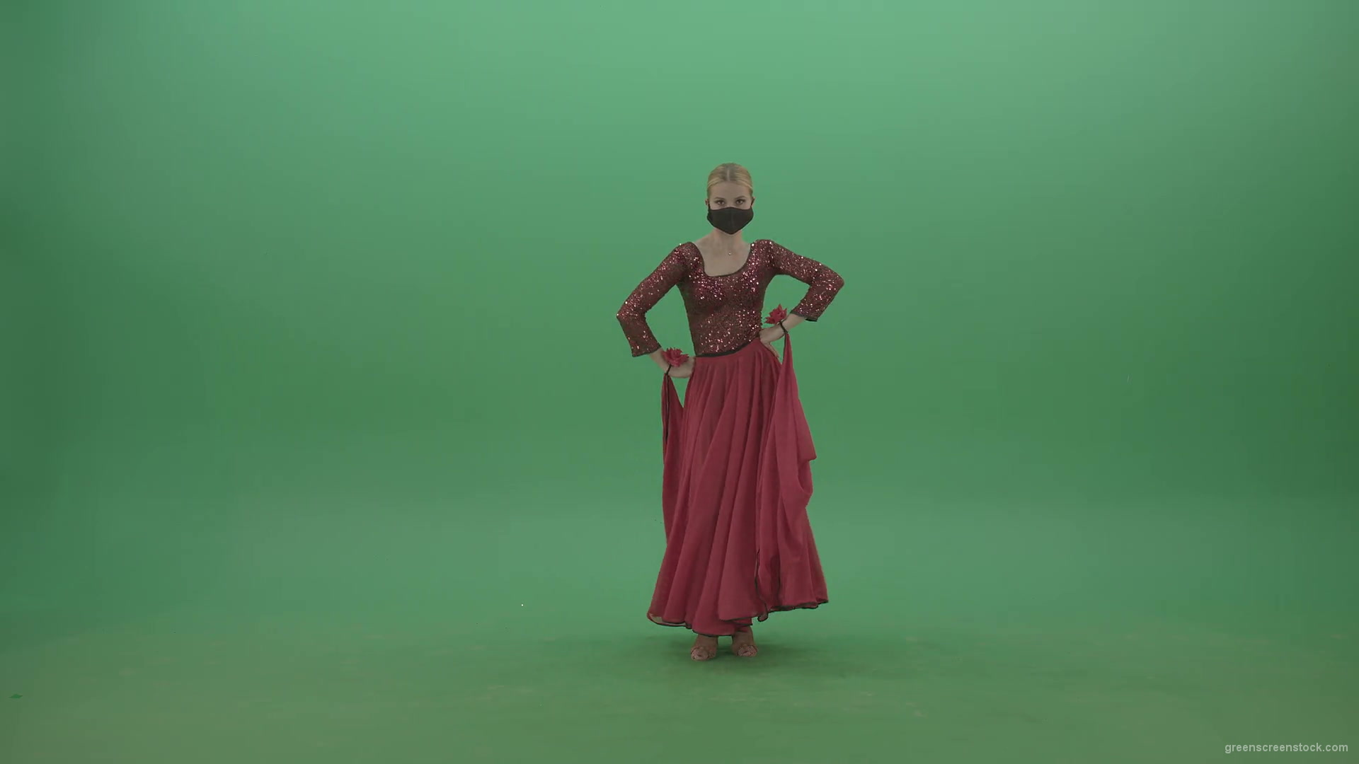 Beauty-Girl-with-black-mask-in-red-rumba-dress-waving-arms-isolated-on-green-screen-4K-Video-Footage-1920_006 Green Screen Stock