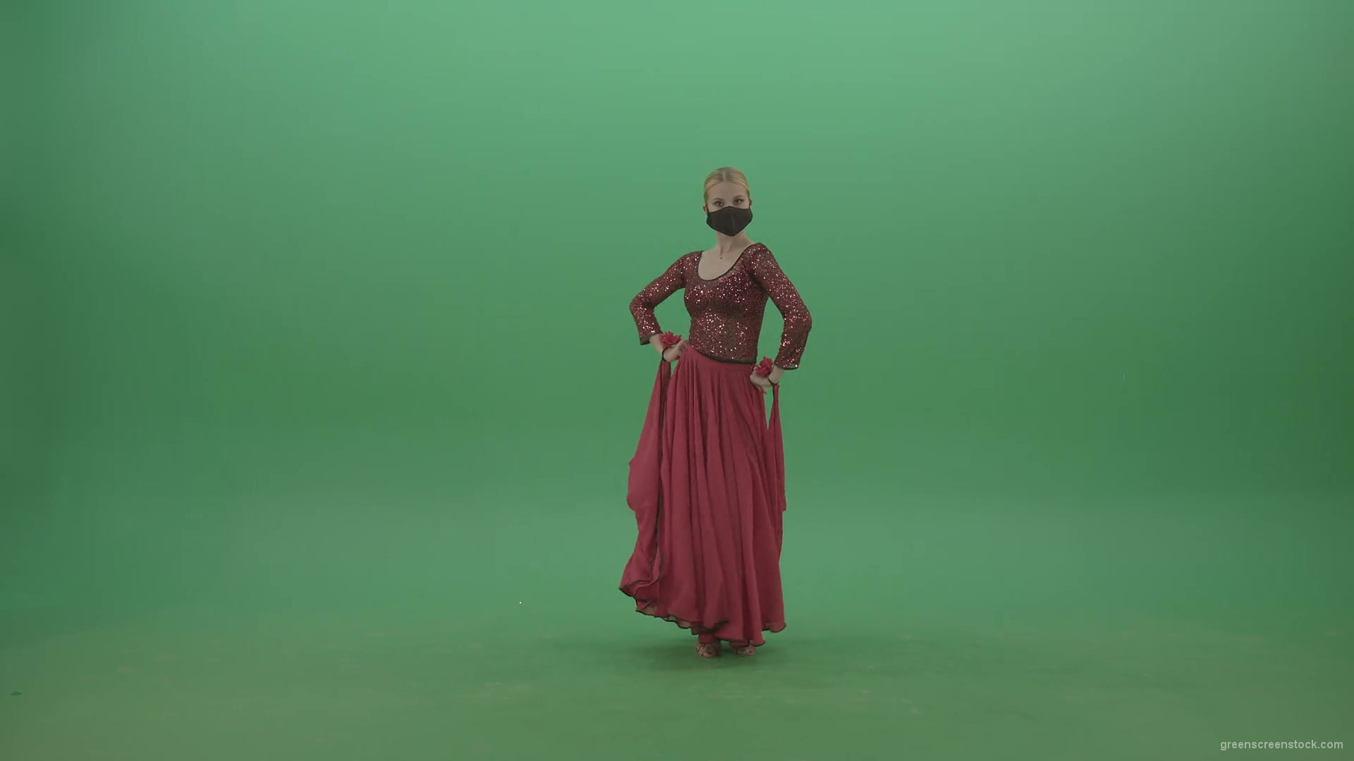 Beauty-Girl-with-black-mask-in-red-rumba-dress-waving-arms-isolated-on-green-screen-4K-Video-Footage-1920_007 Green Screen Stock