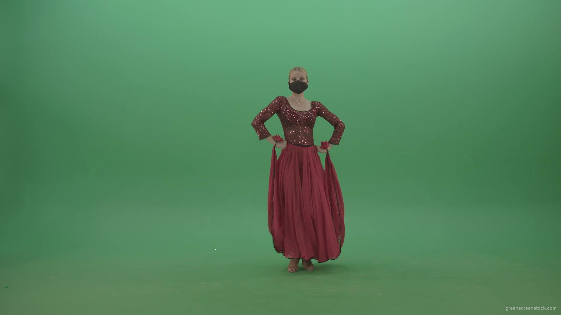 Beauty-Girl-with-black-mask-in-red-rumba-dress-waving-arms-isolated-on-green-screen-4K-Video-Footage-1920_008 Green Screen Stock