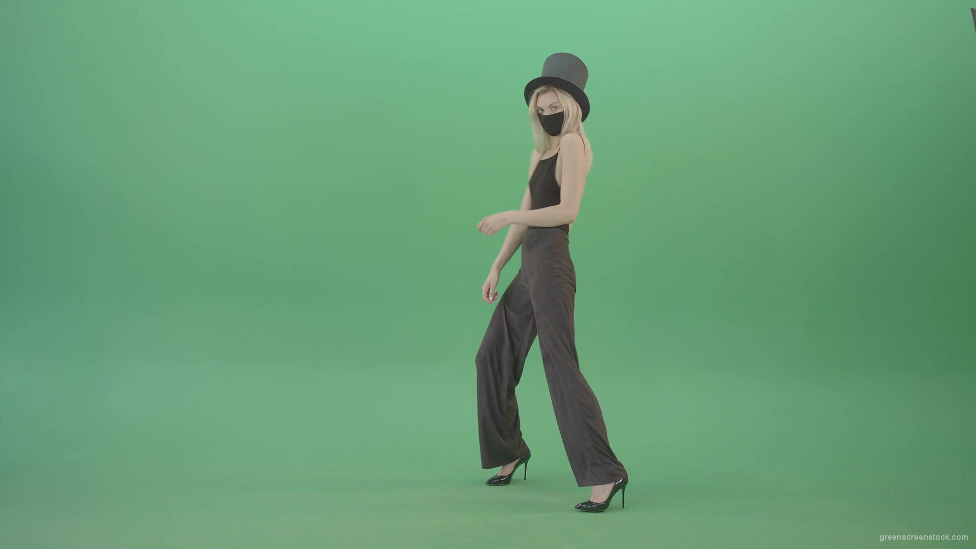 Covid-Mask-Girl-in-Black-cylinder-Hat-dancing-in-front-and-back-side-view-isolated-on-green-screen-Video-Footage-1920_004 Green Screen Stock