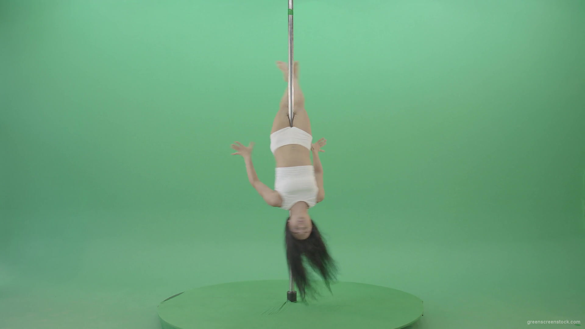 Dark-Hair-Girl-in-White-body-dress-underwear-spinning-on-the-pilon-showing-exotic-dance-over-green-screen-4K-Video-Footage-1920_006 Green Screen Stock