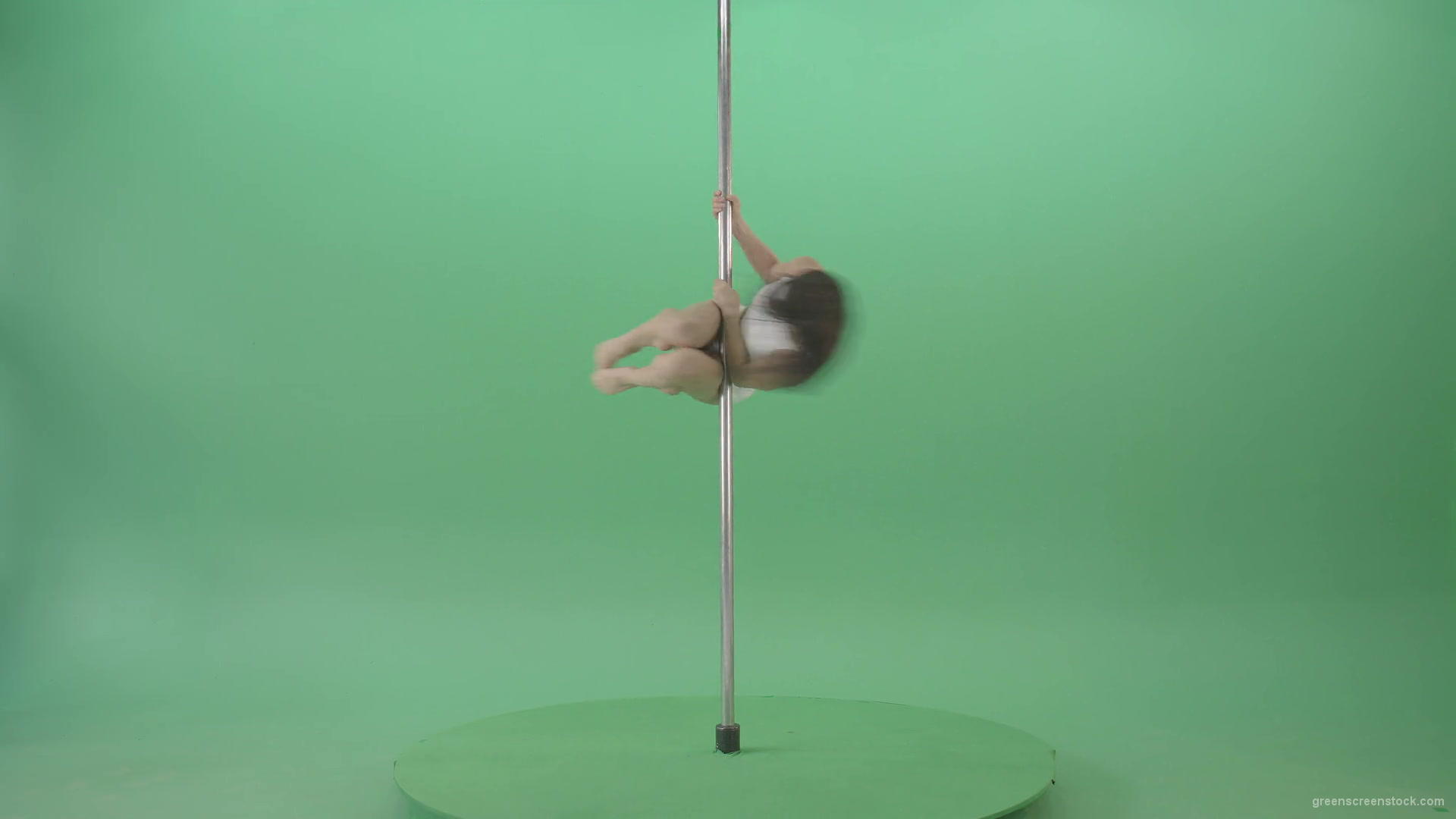 Go-Go-Girl-in-white-dress-spinning-on-the-pole-and-sit-on-a-twine-on-green-screen-4K-Video-Footage-1920_004 Green Screen Stock