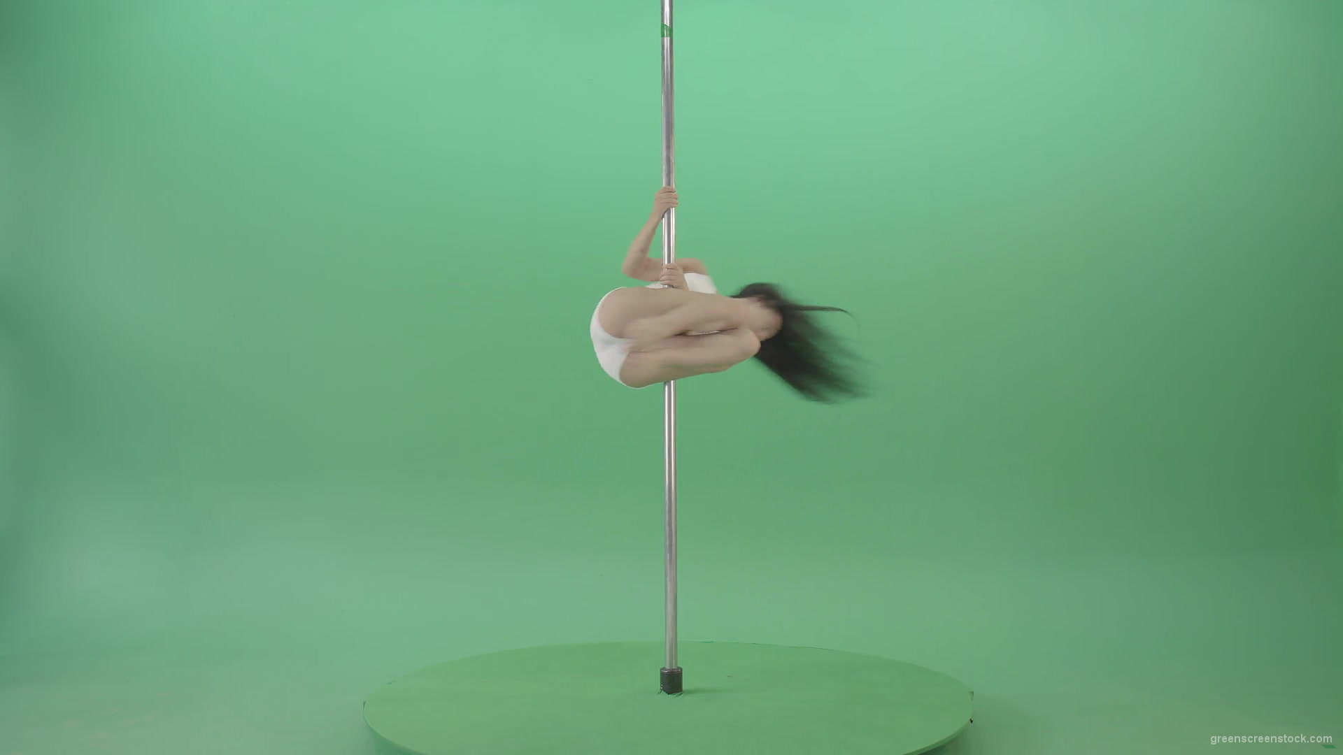 Go-Go-Girl-in-white-dress-spinning-on-the-pole-and-sit-on-a-twine-on-green-screen-4K-Video-Footage-1920_006 Green Screen Stock