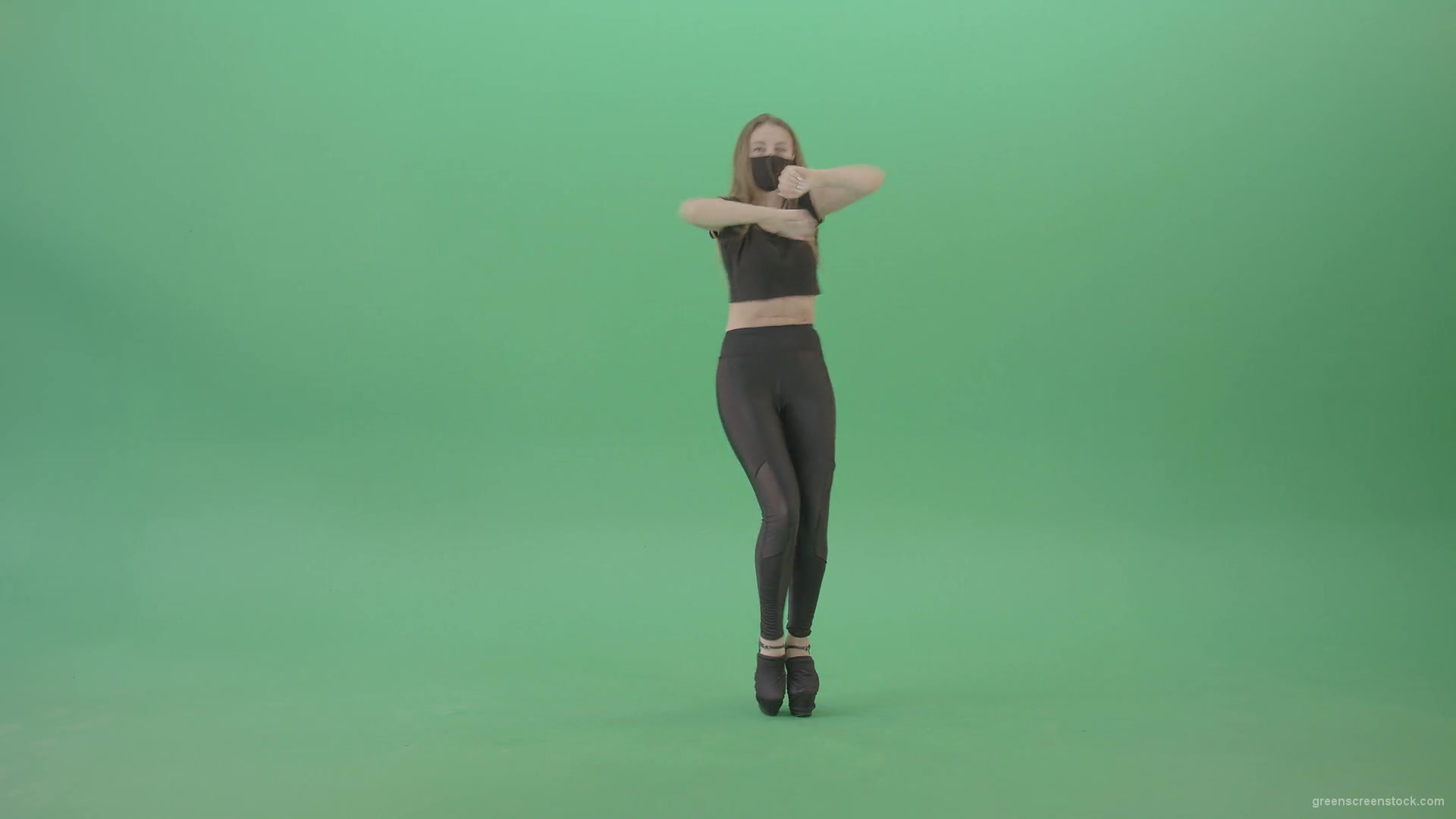 Sexy-girl-in-black-mask-and-costume-dancing-with-erotic-moves-isolated-on-green-screen-4K-video-footage-1920_004 Green Screen Stock