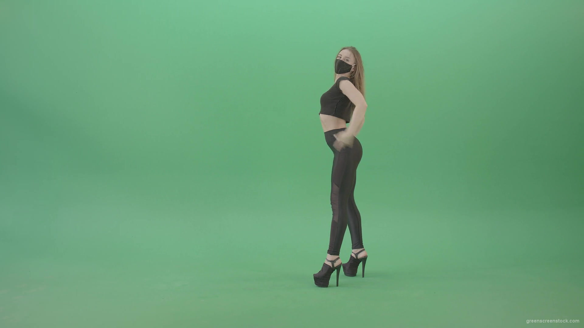 Sexy-girl-in-black-mask-and-costume-dancing-with-erotic-moves-isolated-on-green-screen-4K-video-footage-1920_005 Green Screen Stock