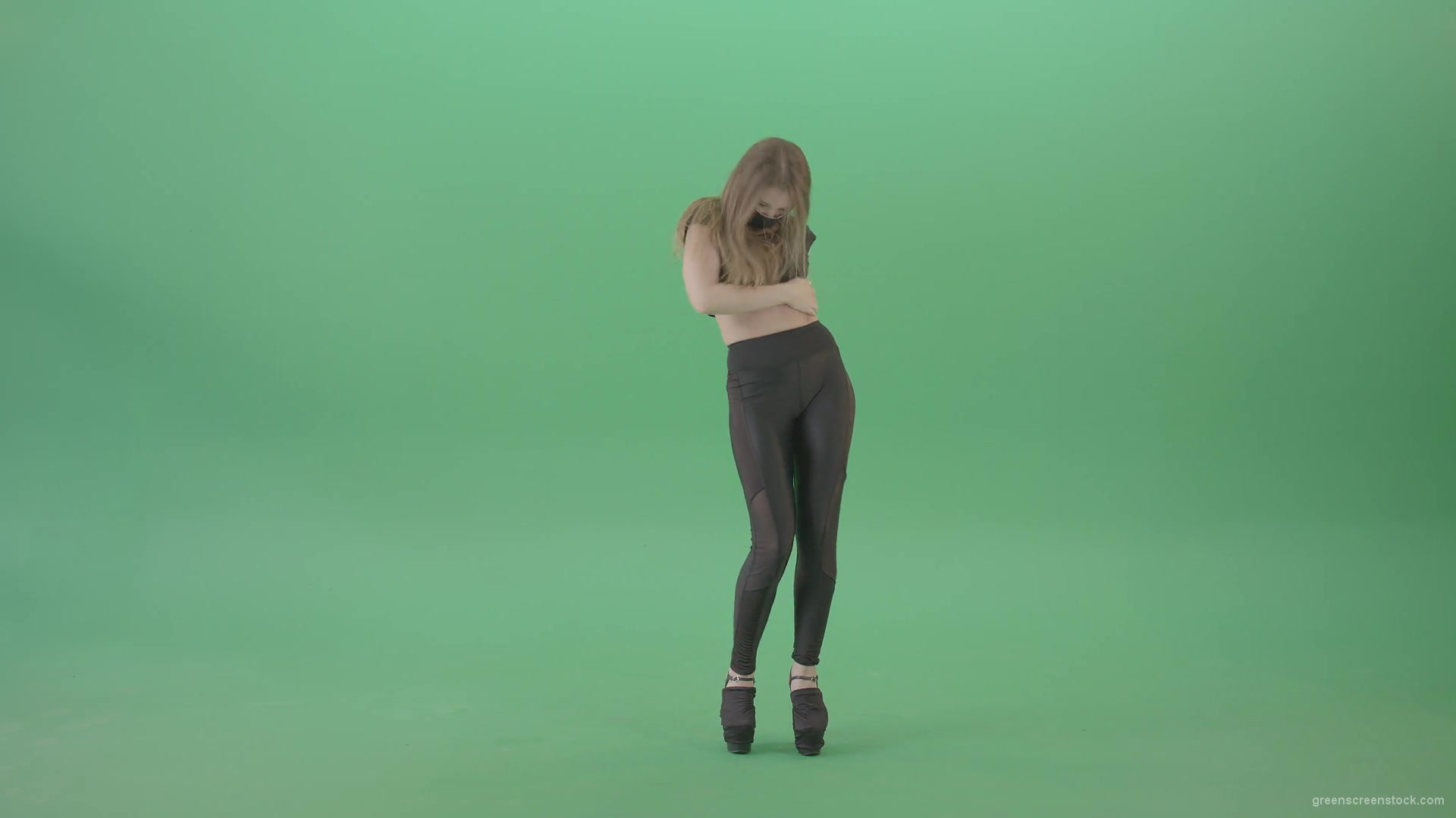 Sexy-girl-in-black-mask-and-costume-dancing-with-erotic-moves-isolated-on-green-screen-4K-video-footage-1920_007 Green Screen Stock