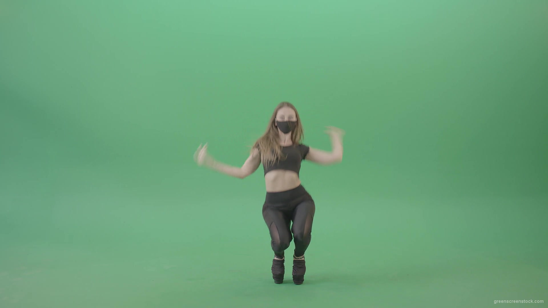 Sexy-girl-in-black-mask-and-costume-dancing-with-erotic-moves-isolated-on-green-screen-4K-video-footage-1920_008 Green Screen Stock