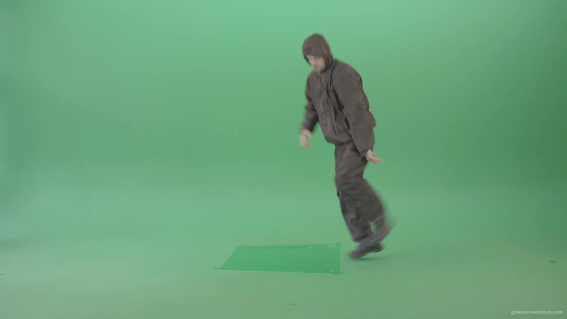 Breakdancer-making-power-move-spinning-on-head-dancing-in-green-screen-studio-4K-Video-Footage-1920_002 Green Screen Stock