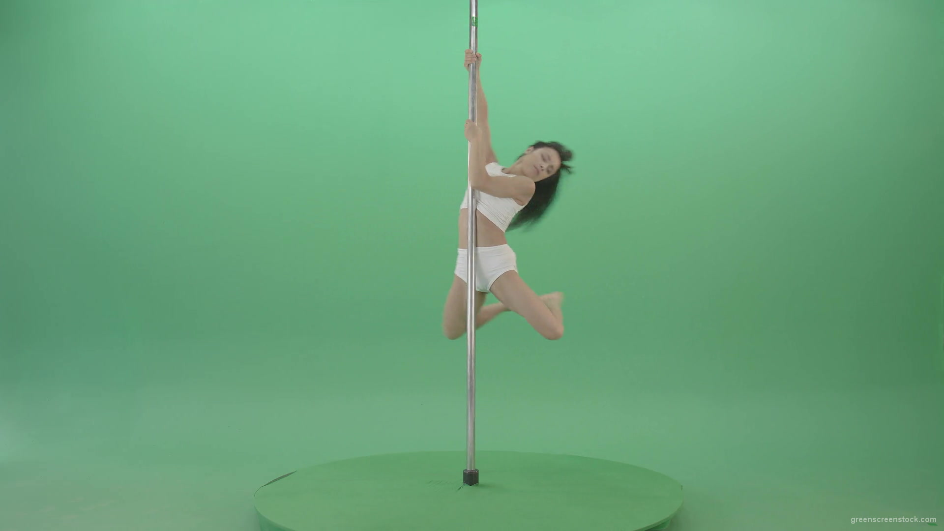Pole-dance-trainer-girl-has-a-sport-flight-on-green-screen-4K-Video-Footage-1920_005 Green Screen Stock