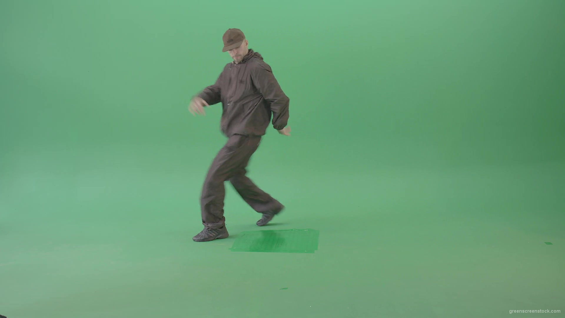 Street-Dancer-man-showing-hip-hop-break-dance-elements-on-green-screen-4K-Video-Footage-1920_005 Green Screen Stock